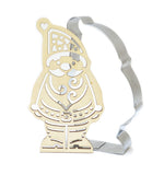 Emporte pièce en inox avec son tampon en bois de la même forme avec des motifs. Ils ont la forme d'un père Noël.