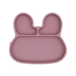 Assiette en silicone pour enfant en forme de lapin, elle est de couleur rose et comporte 3 compartiments