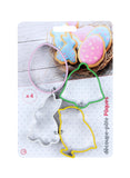 Photo d'un pack de 4 découpes pâte sur le theme de pâques avec 4 formes differentes : oeuf, cloche, poussin et lapin