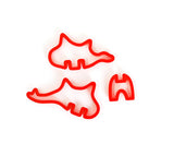 3 emportes pièces de couleur rouge en forme de dinosaure