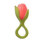 Jouet de dentition sur fond blanc, en forme de fleur. Il représente une tulipe, les couleurs et détails sont très proche de la réalité
