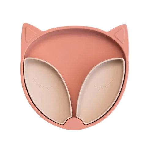 Assiette en silicone pour enfant en forme de renard. sa base est en forme de tête de renard et ses yeux sont 2 compartiments amovibles et indépendants