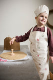 Ensemble de tablier et toque pour enfant en coton avec des illustrations brodées sur le theme de Noël