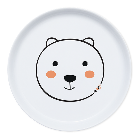 Assiette en porcelaine blanche avec une illustration de tête d’animal rigolos au centre. Elle est de la marque Cibolo , indiqué sur l’oval du visage. L’assiette permet de créer des repas rigolos en animant le personnage