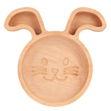 Assiette en bois pour enfant en forme de tête de lapin, elle possède 3 compartiments