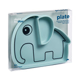 Assiette en silicone de couleur bleu en forme d'eléphant. L'assiette a 2 compartiment son corp et son oreille. Elle est posée sur on fond blanc, et elle est dans son emballage