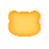 Bol pour enfant en forme de tête d'ours de couleurjaune. Les 2 sont en silicone et ils sont photographiés sur un fond blanc