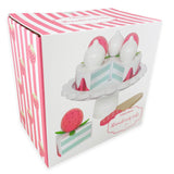 Emballage d'un jouet pour enfant, contenant une gâteau aux fraises. Sur le devant de la boîte il y a une photo du jouet avec une étiquette indiquant le modèle ainsi que lamarque du jouet Jabadabado