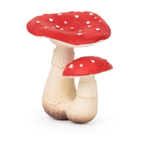 Jouet pour enfant en silicone posé sur un fond blanc. Le jouet de dentition est en forme de 2 champignon, un gros et un petit. Les champignon sont de couleur blanc et rouge