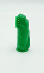 Photo d'une brosse à dents de doigt pour bébé, elle est de couleur verte et represente un dinosaure